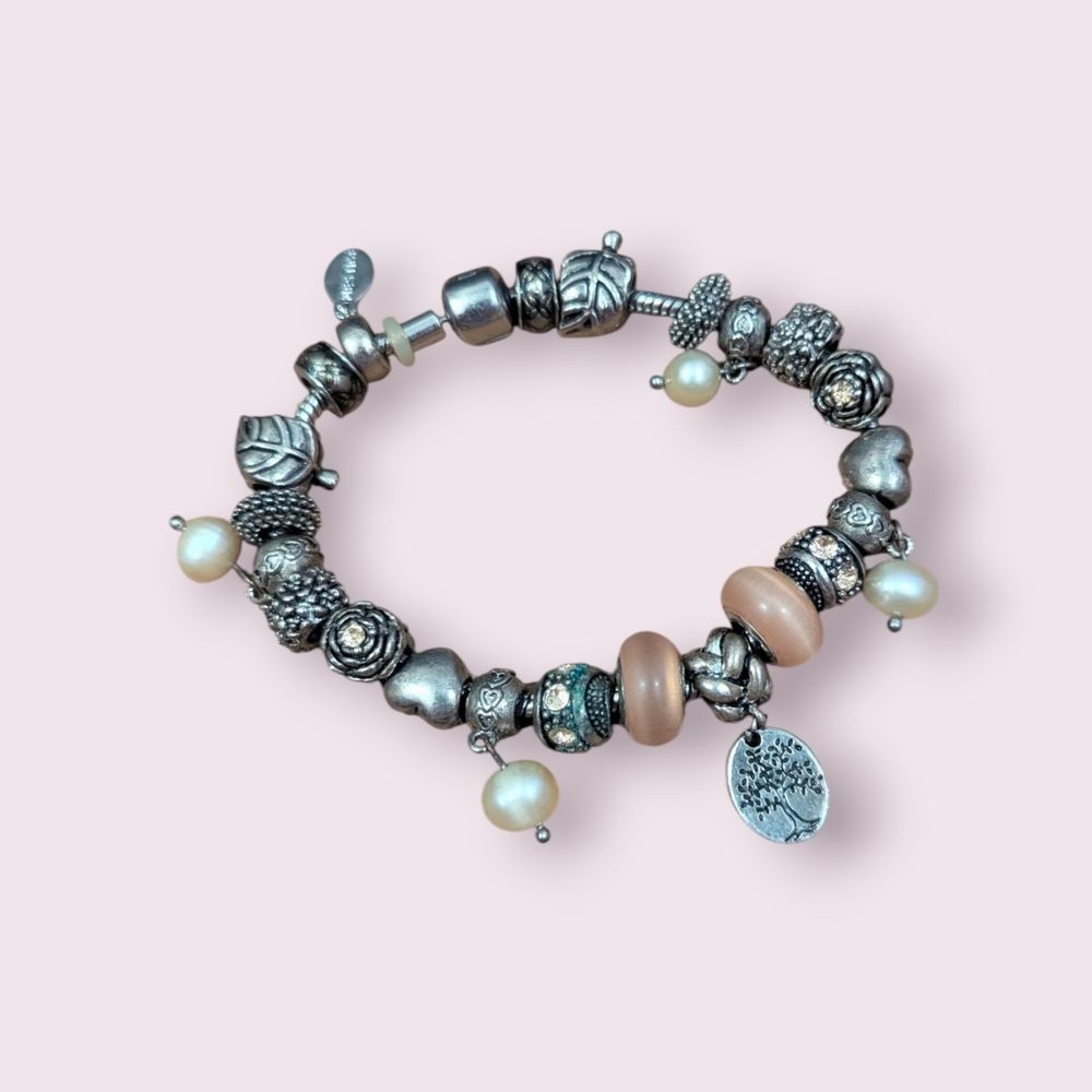Silver and Beige Charm Bracelet